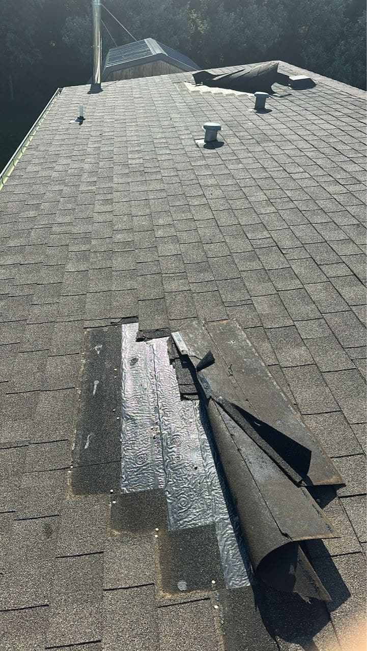 Old step flashing pulled from a shingle roof during a repair